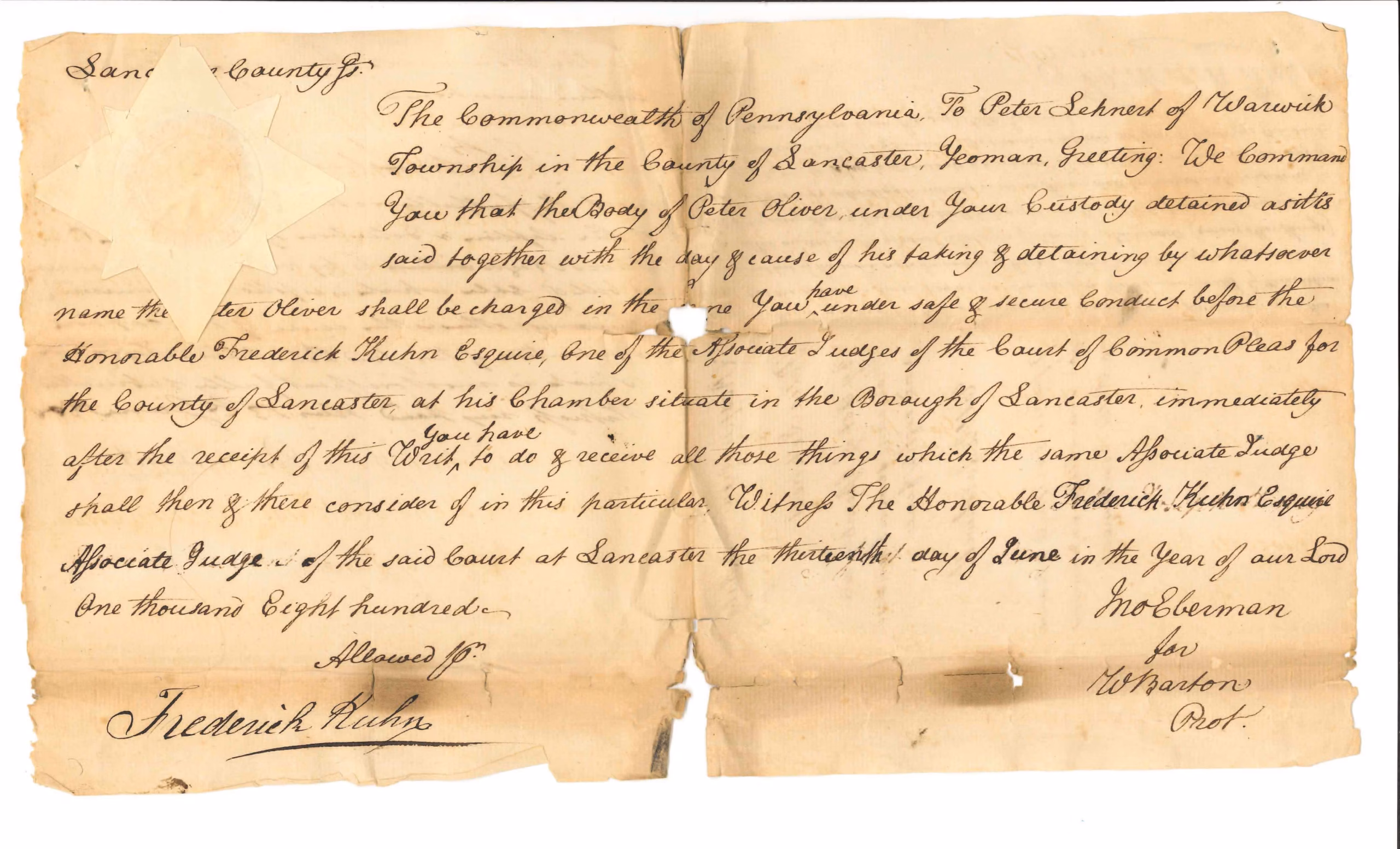 A scanned, aged document from Pennsylvania detailing a legal case concerning Pete Scherer, dated June 1828. Handwritten text, torn edges, creases, and signatures including Frederick Hahn make it a unique addition to your Collections.